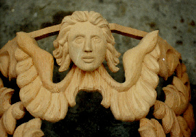 Carved face and wings, sculpture for the pipe organ at Grace Lutheran Church, Tacoma, WA